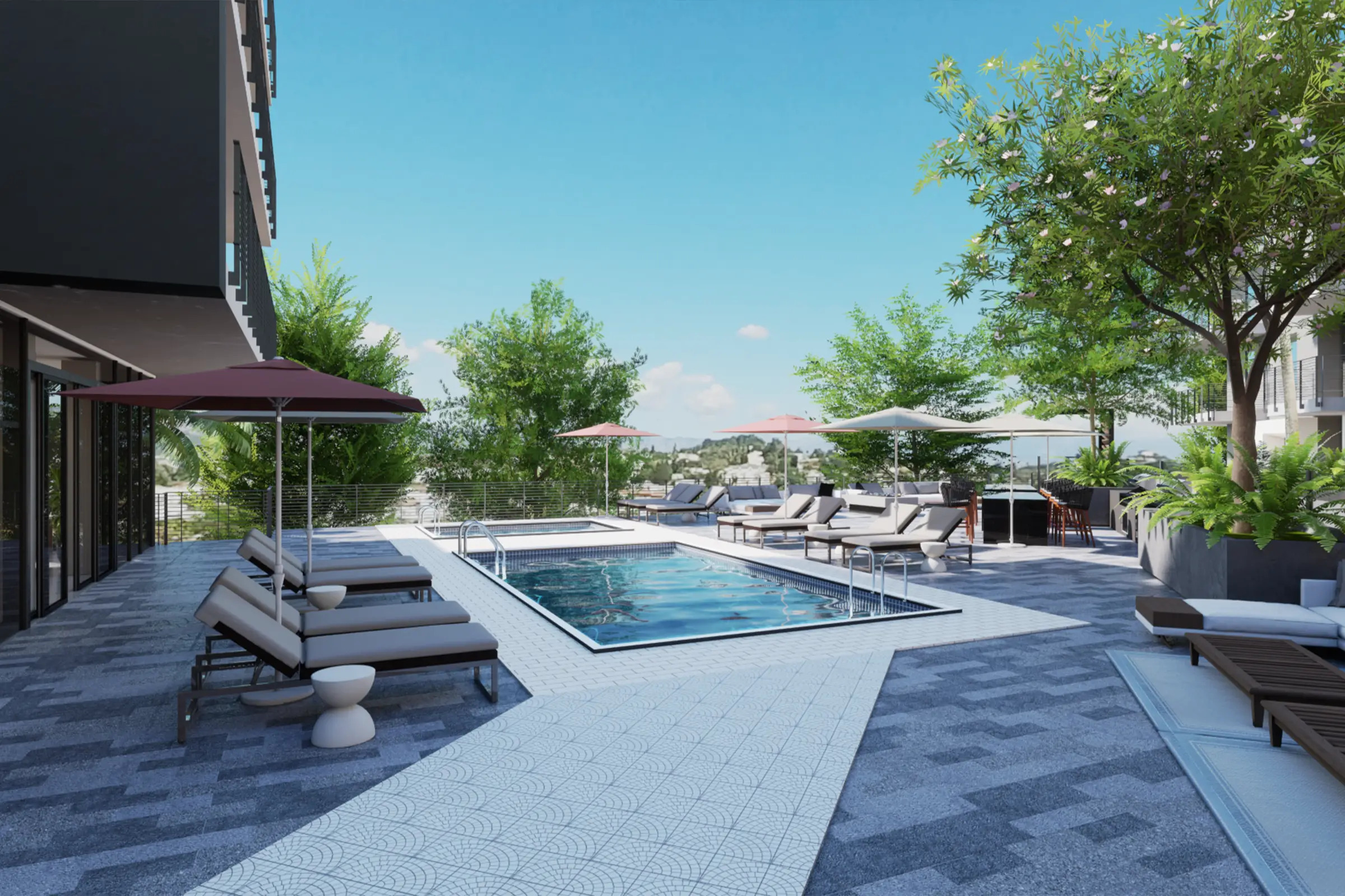 2 Bedroom Apartments in Silverlake Los Angeles CA - Silva LA - Pool DEck with Relaxing Pool, Jacuzzi, Cushioned Lounge Chairs with Umbrellas, Table and Chairs, Trees, Greenery, and Tile Details